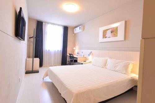 Imagen de la habitación del Hotel Jinjiang Inn Zhuhai Gongbei Fuhuali. Foto 5