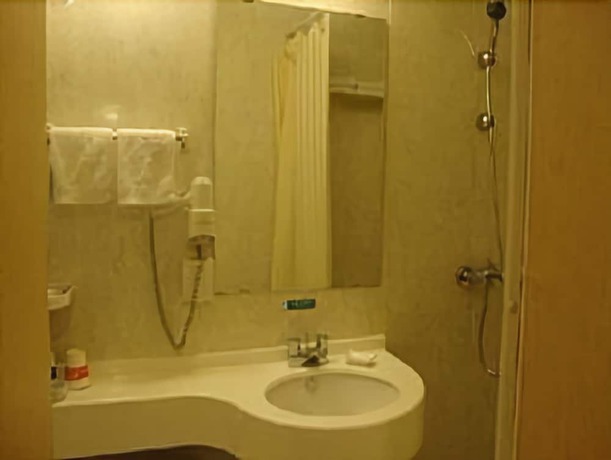 Imagen de la habitación del Hotel Jinjiang Inn Zibo Liuquan Road. Foto 8