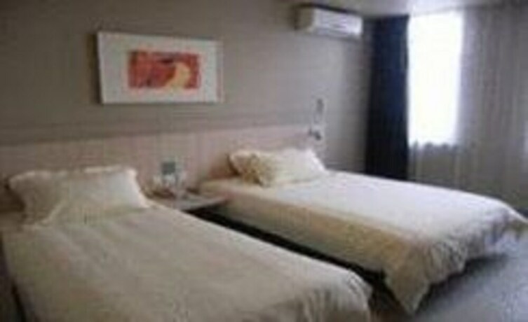 Imagen de la habitación del Hotel Jinjiang Inn Zibo Train Station. Foto 23