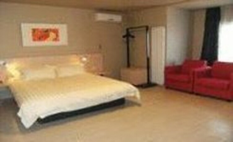 Imagen de la habitación del Hotel Jinjiang Inn Zibo Train Station. Foto 32