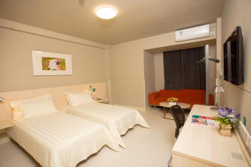 Imagen de la habitación del Hotel Jinjiang Inn (sanya Hexi Road Pedestrian Street Hejing). Foto 6