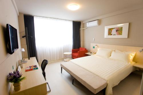 Imagen de la habitación del Hotel Jinjiang Inn (sanya Hexi Road Pedestrian Street Hejing). Foto 7