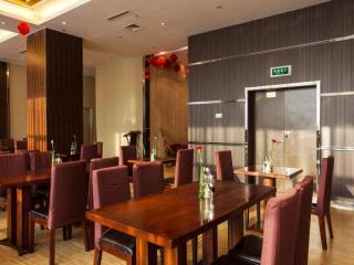 Imagen del bar/restaurante del Hotel Jinjiang Metropolo Fuzhou Cangshan. Foto 3