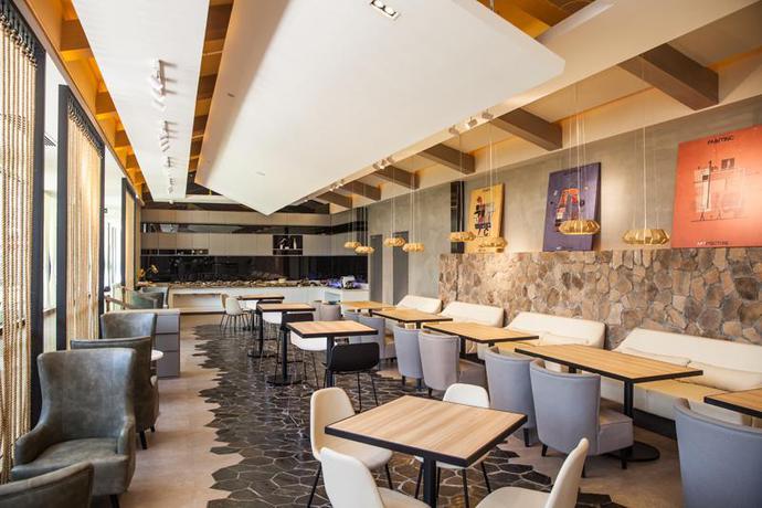 Imagen del bar/restaurante del Hotel Jinjiang Metropolo Hotel - Hangzhou Xiasha. Foto 3