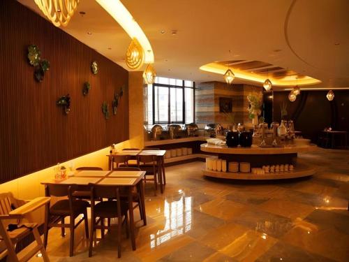 Imagen general del Hotel Jinjiang Metropolo - Liyang Tianmu Lake. Foto 5