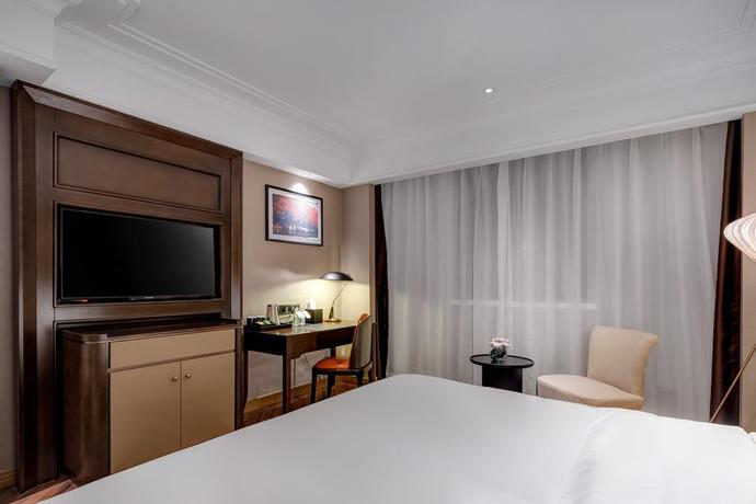 Imagen de la habitación del Hotel Jinjiang Metropolo Nanjing Confucious Qinhuai Classical. Foto 3