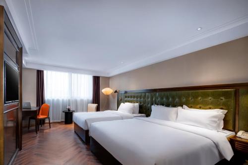 Imagen de la habitación del Hotel Jinjiang Metropolo Nanjing Confucious Qinhuai Classical. Foto 5