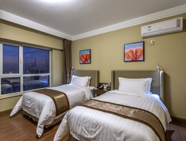 Imagen de la habitación del Hotel Jinjiang Peninsula Seasons. Foto 4