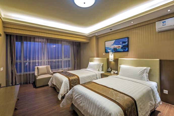 Imagen de la habitación del Hotel Jinjiang Peninsula Seasons. Foto 5