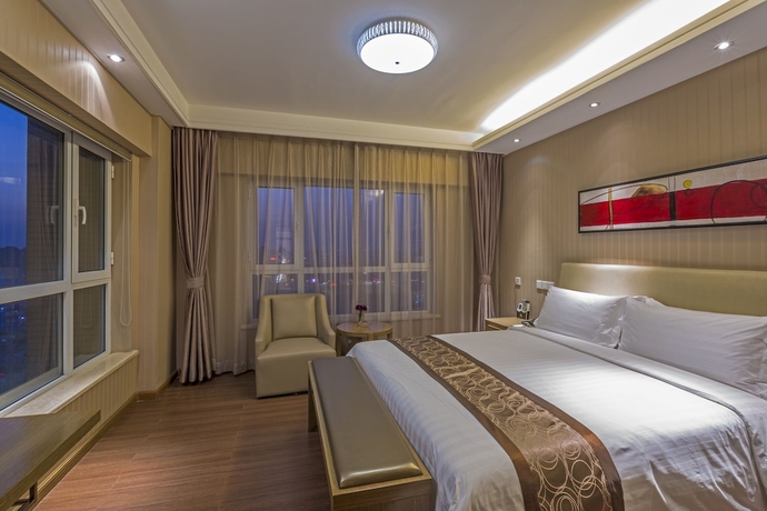 Imagen de la habitación del Hotel Jinjiang Peninsula Seasons. Foto 6