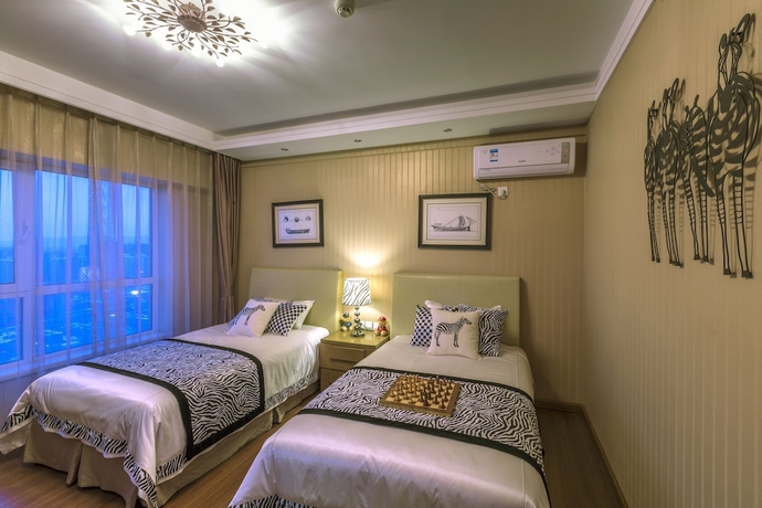 Imagen de la habitación del Hotel Jinjiang Peninsula Seasons. Foto 8