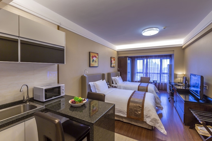 Imagen de la habitación del Hotel Jinjiang Peninsula Seasons. Foto 9