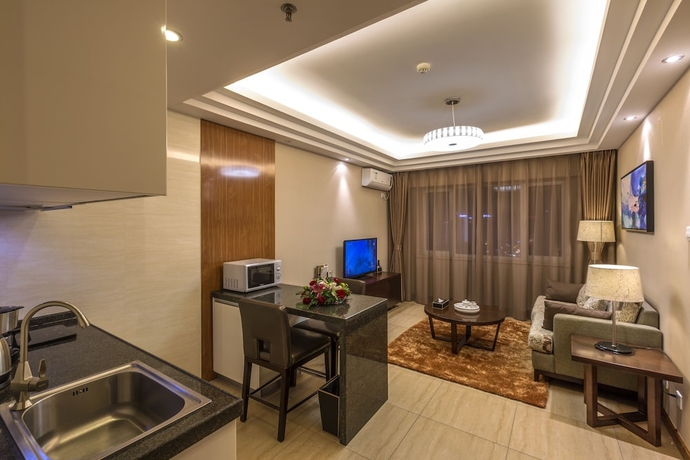 Imagen de la habitación del Hotel Jinjiang Peninsula Seasons. Foto 11