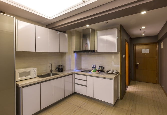 Imagen de la habitación del Hotel Jinjiang Peninsula Seasons. Foto 16