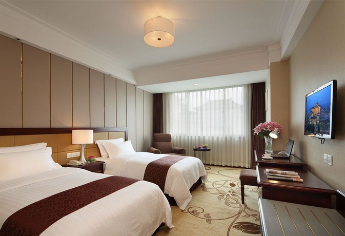 Imagen de la habitación del Hotel Jinjiang West Capital International. Foto 8