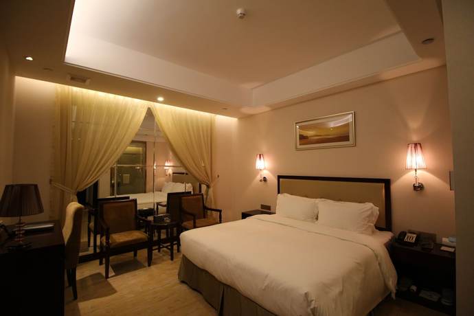 Imagen de la habitación del Hotel Jinjiu Hotel - Xiamen. Foto 14
