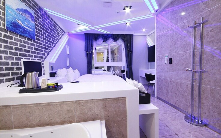 Imagen de la habitación del Hotel Jinju Best Gallery. Foto 19