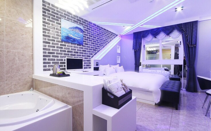 Imagen de la habitación del Hotel Jinju Best Gallery. Foto 20