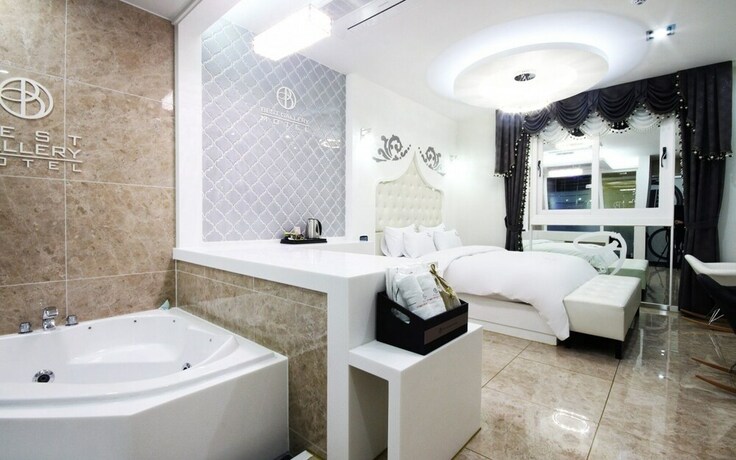 Imagen de la habitación del Hotel Jinju Best Gallery. Foto 23