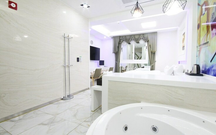 Imagen de la habitación del Hotel Jinju Best Gallery. Foto 27