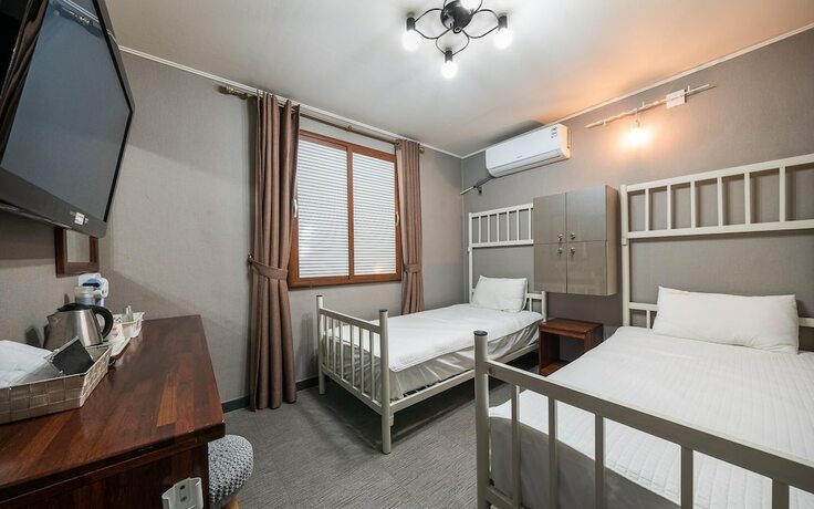 Imagen de la habitación del Hotel Jinju Cozy. Foto 8