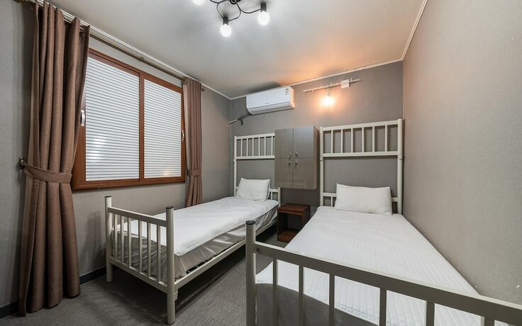 Imagen de la habitación del Hotel Jinju Cozy. Foto 9