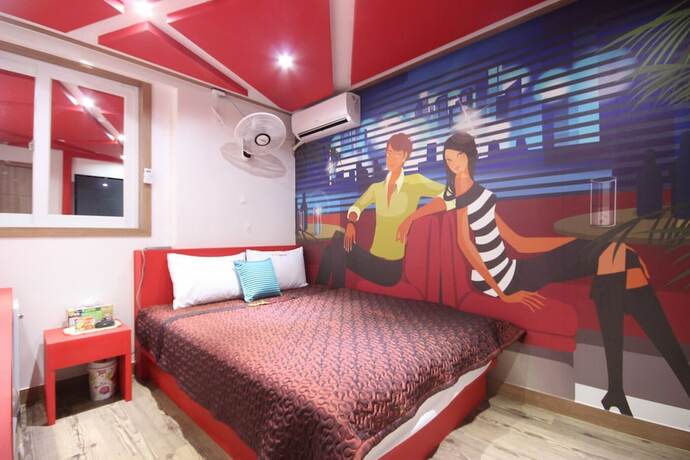 Imagen de la habitación del Hotel Jinju EM. Foto 2