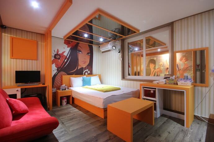 Imagen de la habitación del Hotel Jinju EM. Foto 3