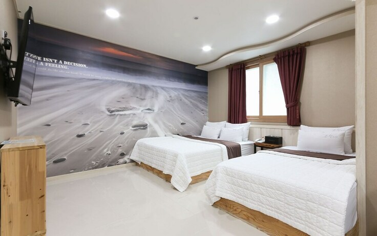Imagen de la habitación del Hotel Jinju Funny. Foto 22