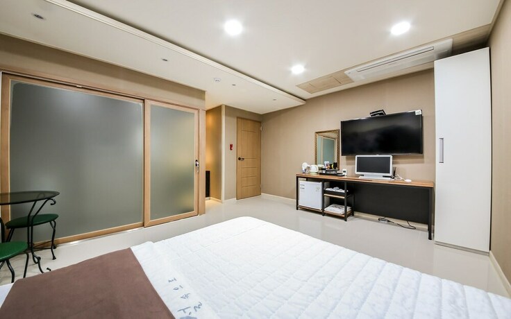 Imagen de la habitación del Hotel Jinju Funny. Foto 26