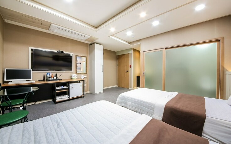 Imagen de la habitación del Hotel Jinju Funny. Foto 27