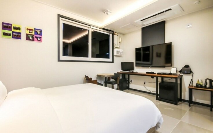 Imagen de la habitación del Hotel Jinju Hot. Foto 11