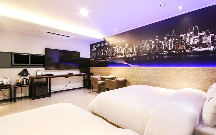 Imagen de la habitación del Hotel Jinju Hot. Foto 24