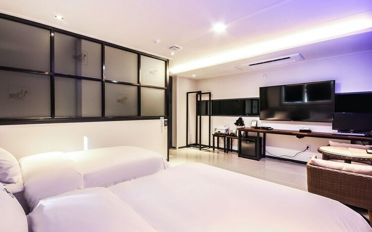 Imagen de la habitación del Hotel Jinju Hot. Foto 26