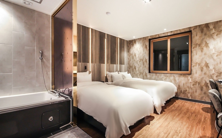 Imagen de la habitación del Hotel Jinju JS. Foto 1