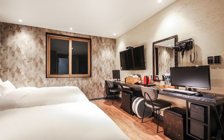 Imagen de la habitación del Hotel Jinju JS. Foto 2