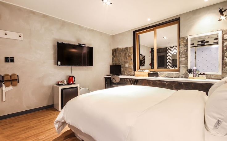 Imagen de la habitación del Hotel Jinju JS. Foto 3