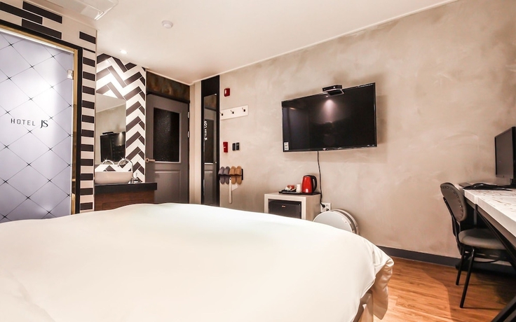Imagen de la habitación del Hotel Jinju JS. Foto 9