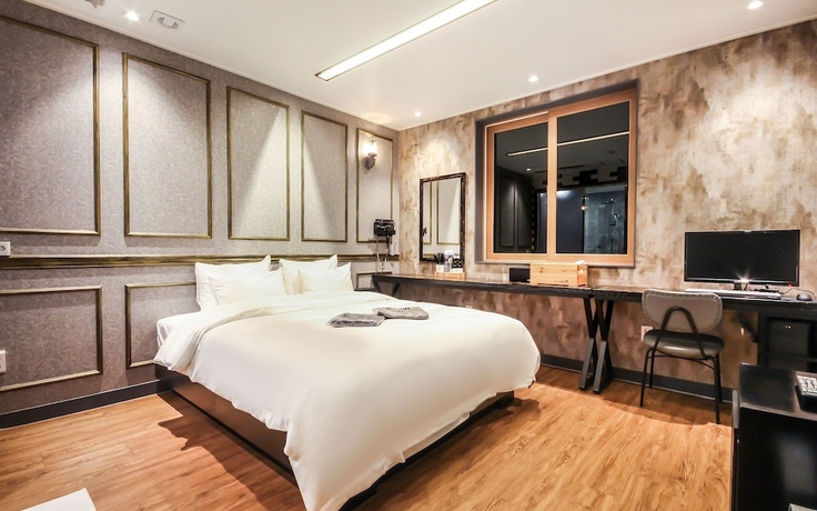 Imagen de la habitación del Hotel Jinju JS. Foto 11