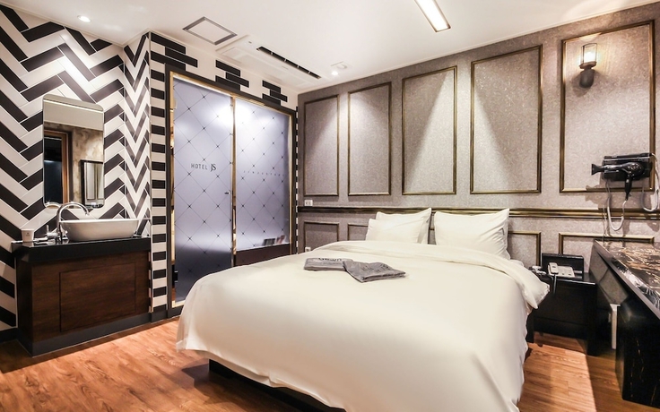 Imagen de la habitación del Hotel Jinju JS. Foto 12