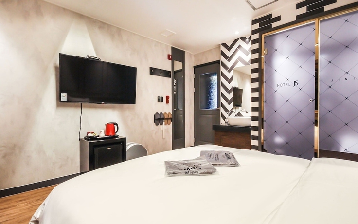 Imagen de la habitación del Hotel Jinju JS. Foto 13