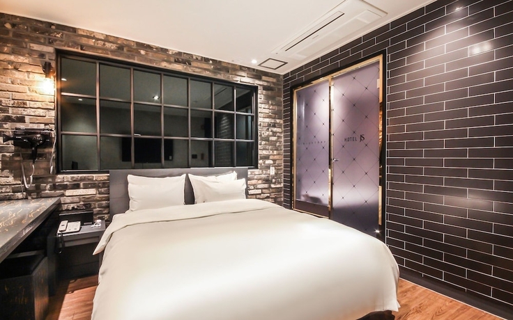 Imagen de la habitación del Hotel Jinju JS. Foto 18