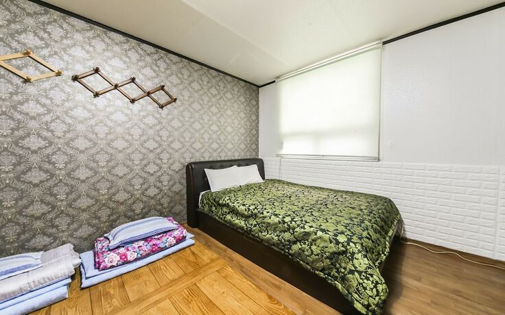Imagen de la habitación del Hotel Jinju Kong. Foto 3