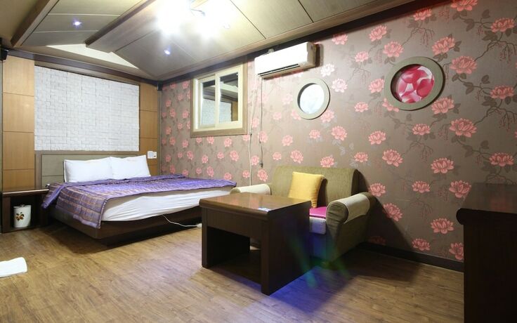 Imagen de la habitación del Hotel Jinju MT. Foto 2