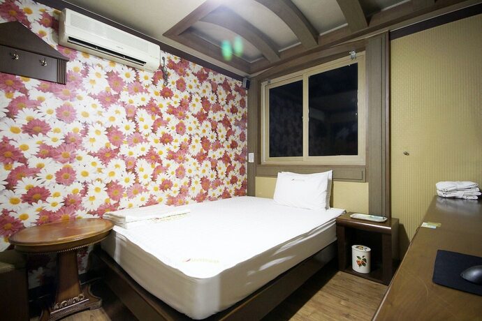 Imagen de la habitación del Hotel Jinju MT. Foto 4