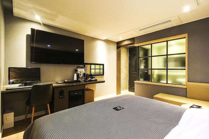 Imagen de la habitación del Hotel Jinju Nine. Foto 11