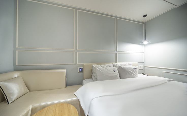 Imagen de la habitación del Hotel Jinju Nine. Foto 13