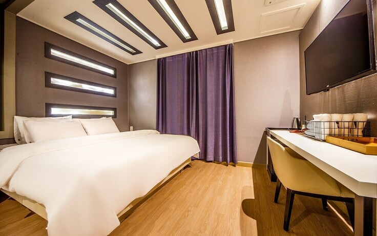 Imagen de la habitación del Hotel Jinju Servi. Foto 20