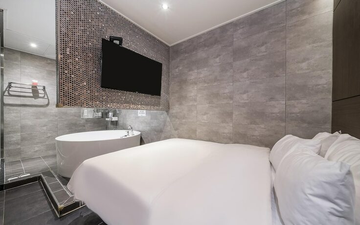 Imagen de la habitación del Hotel Jinju Seven. Foto 11