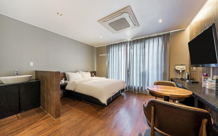 Imagen general del Hotel Jinju Seven. Foto 4